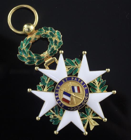A late 19th century cased French 18ct gold and enamel Legion of Honour badge, 58mm.
